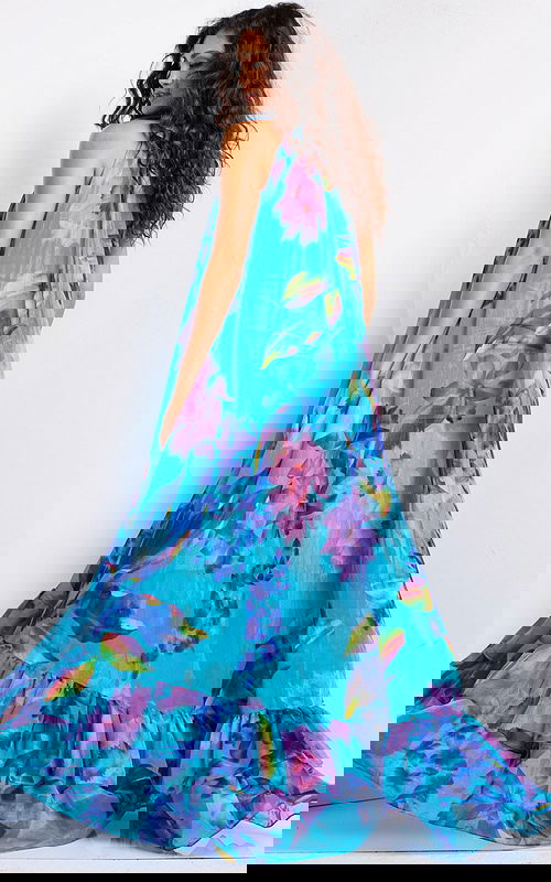 Back view of Jovani 38721 dress, showcasing the vibrant print and flowing fabric.