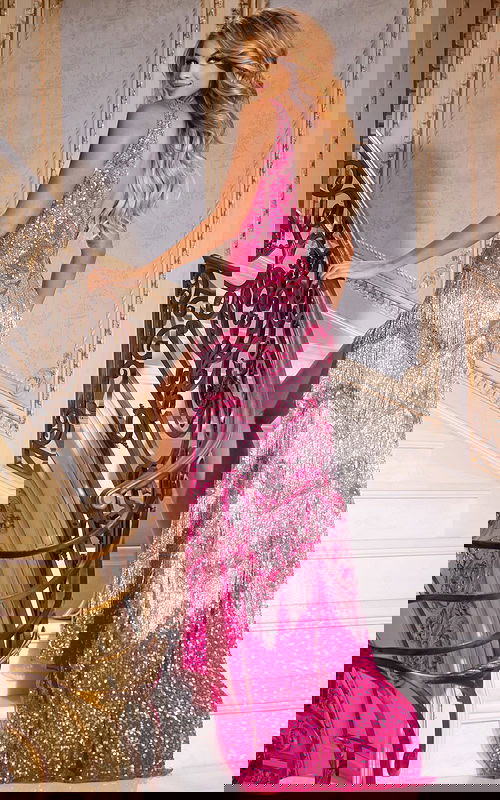 model wearing 38847 pink gown back view with elegant train