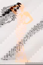 Nude fitted mermaid gown with purple sequin floral details and open back