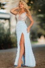 Model wearing Jovani 38912 front view with beaded bodice in blue.