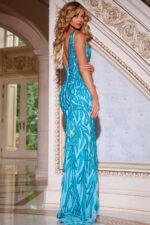 Back view of Jovani 38917 blue gown with low back and sequined design.