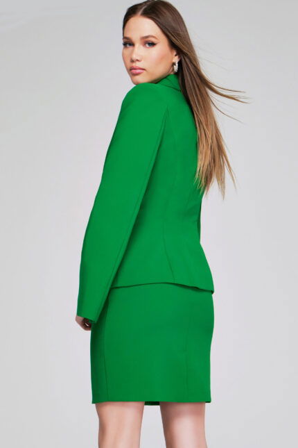 Back view of model wearing Jovani 38926 green dress showing fitted back.