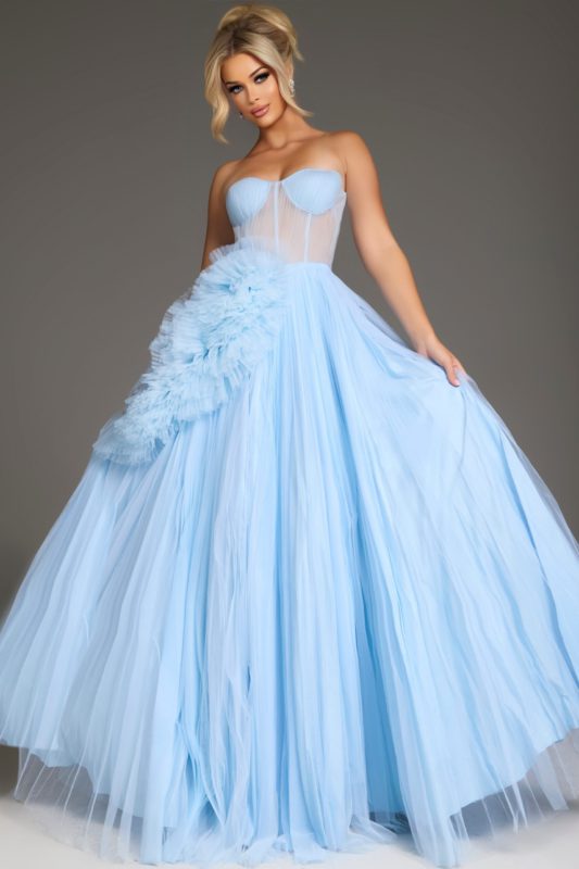Model wearing Jovani 38946 black gown, front view highlighting detailed bodice and flowy skirt.