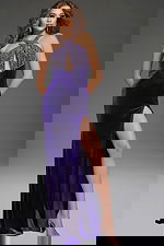 Model wearing Jovani 38951 purple gown with intricate beading and elegant slit, front view.