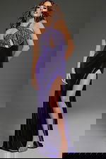 Model wearing Jovani 38951 purple gown with beaded neckline and high slit, front view.