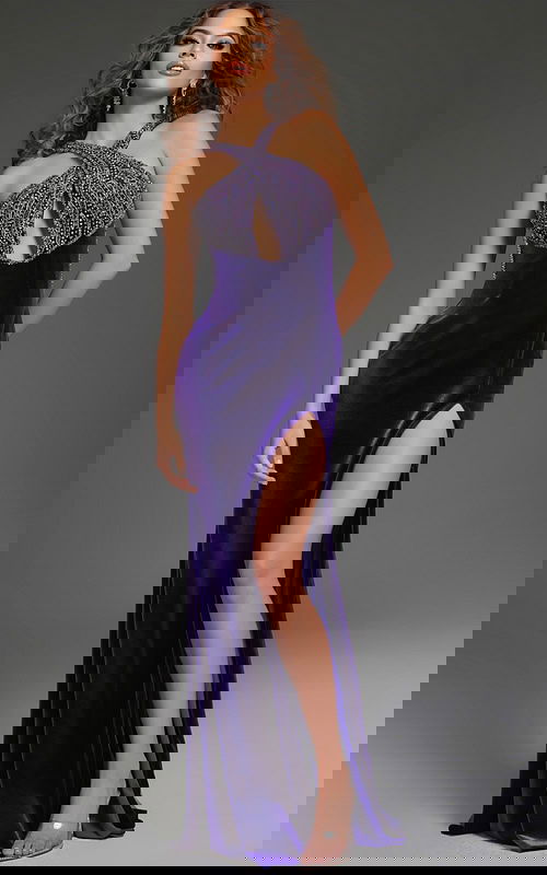 Model wearing Jovani 38951 purple gown with beaded neckline and high slit, front view.