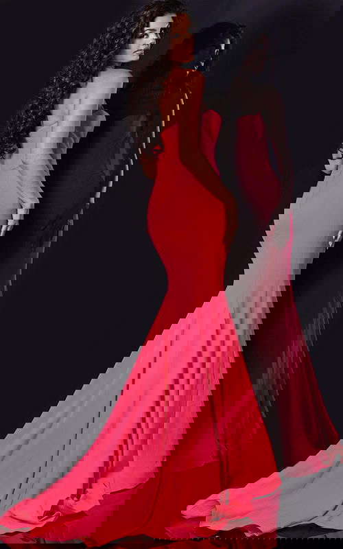 Back view of model wearing Jovani 38974 pink mermaid gown with flared silhouette