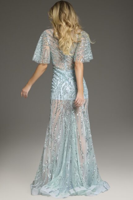 Back view of model wearing Jovani 39008 blue gown with glittering accents.