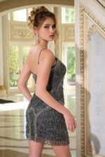 Model wearing Jovani 39017 gray dress, back view highlighting elegant details.