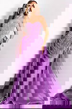 Back view of purple evening dress with flowing detachable train