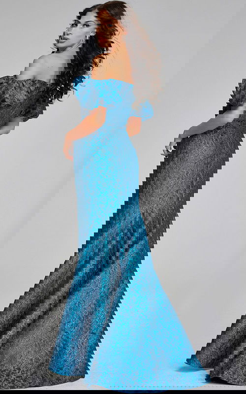 Back view of model wearing Jovani 39113, showcasing the dress's elegant teal fabric and fitted silhouette.