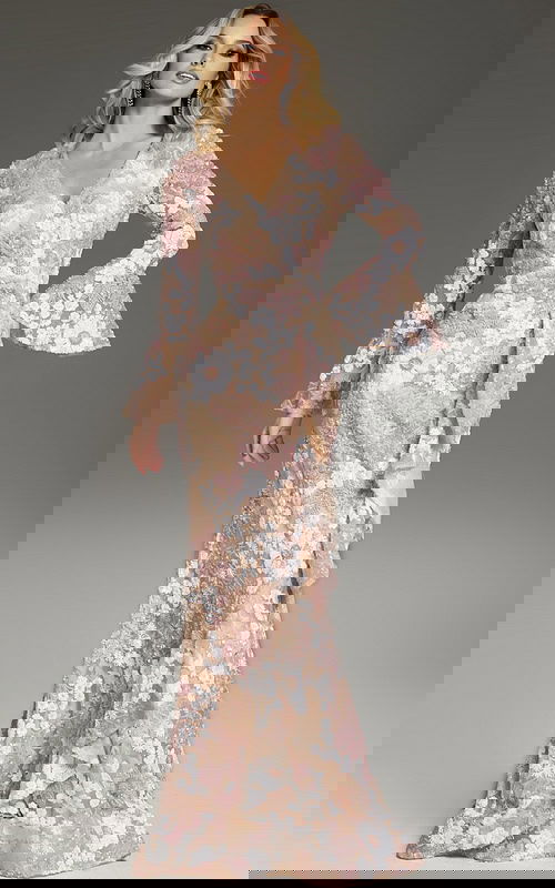 Model wearing Jovani 39118 nude gown with V-neck and floral embroidery, front view.