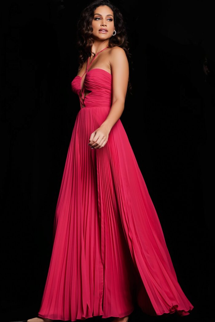 model in Jovani 39139 fuchsia dress, side angle showing pleated design