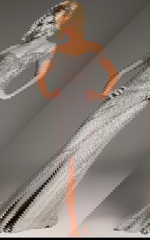 Model wearing Jovani 39175 silver dress from the front, showcasing a sweetheart neckline and embellished bodice.