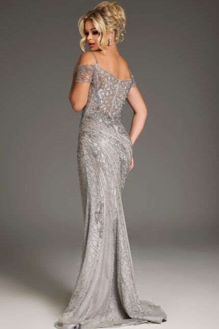 Model wearing Jovani 39175 silver dress, viewed from the back, highlighting the elegant silhouette and intricate details.