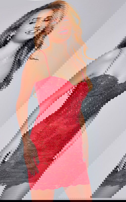 Model wearing Jovani 39332, short red lace dress with sequins, front view.