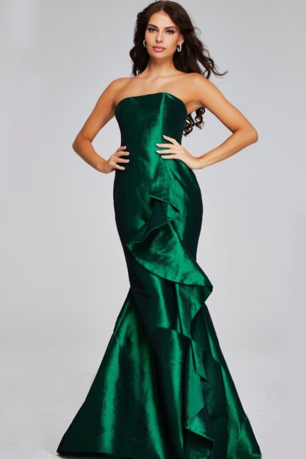 Model wearing Jovani 39368 green gown with ruffle detail, front view.