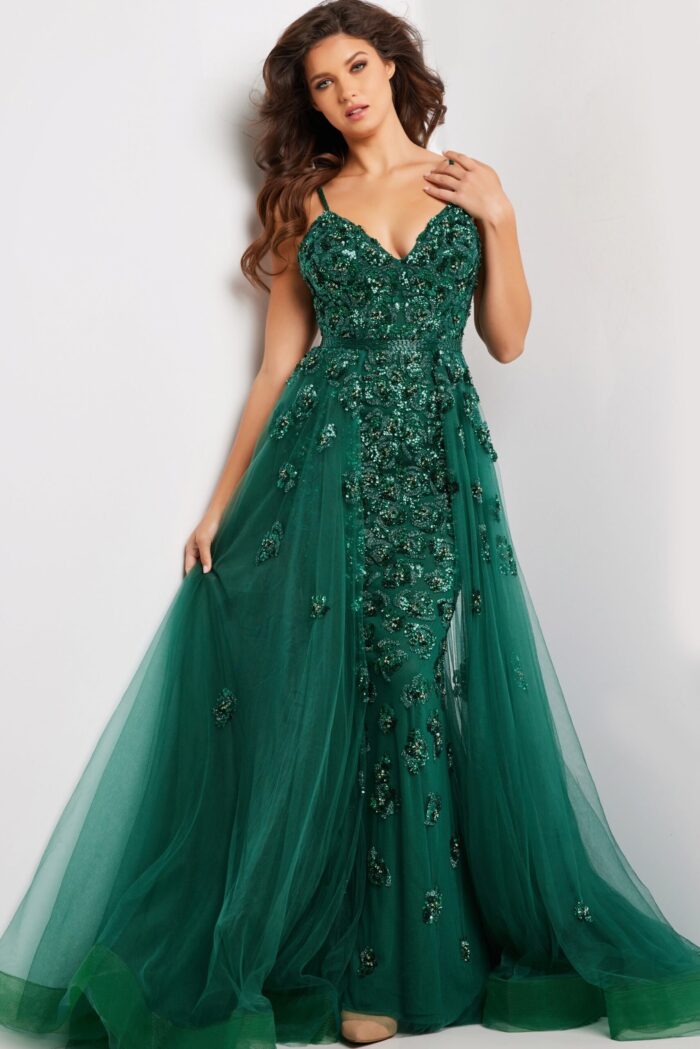 Model wearing 39434 green gown with deep V-neck and sequins, front view