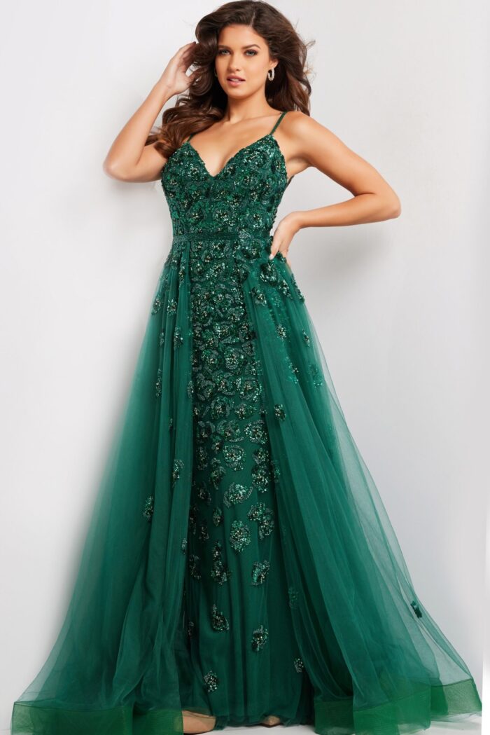 Model wearing 39434 green gown with deep V-neck and sequins, front view