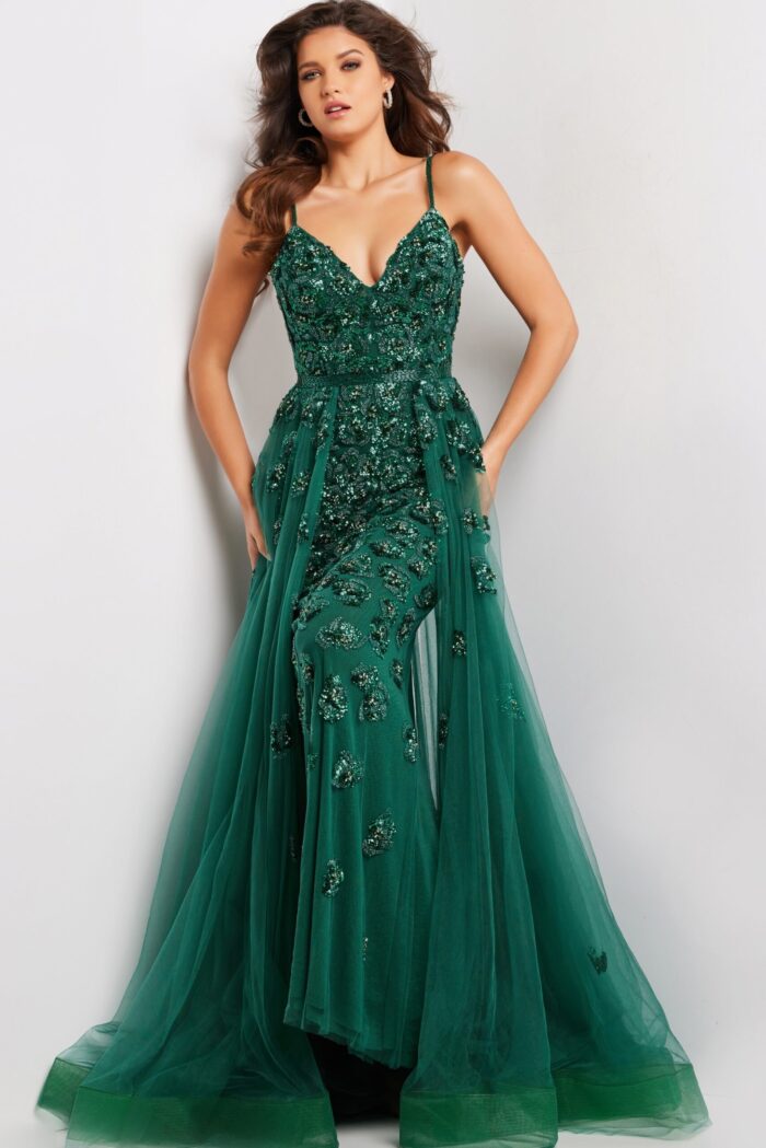 Model wearing 39434 green gown with deep V-neck and sequins, front view