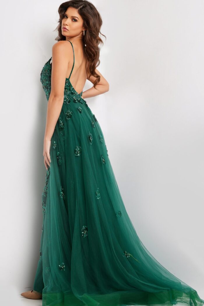 Model wearing 39434 green gown with sequins, back view
