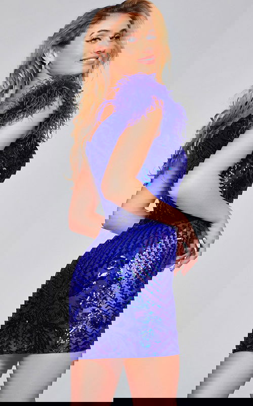 Side view of model in Jovani 39448 royal blue sequined dress showing intricate pattern.