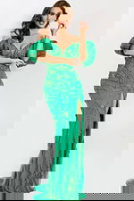 Beaded green gown featuring sweetheart neckline and embellishments