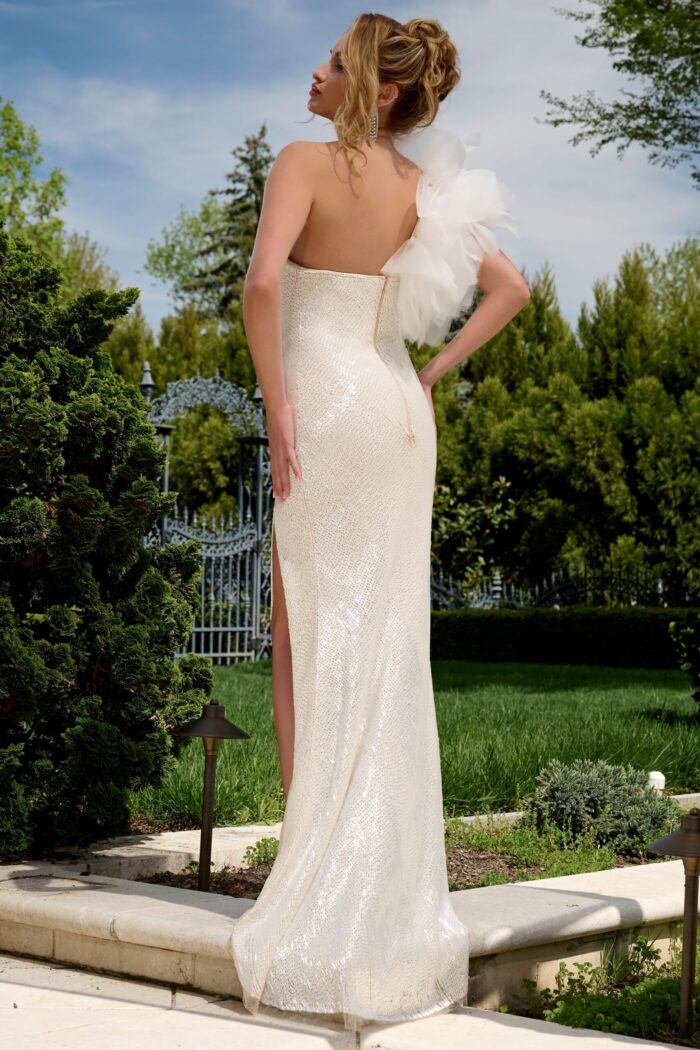 Back view of model in Jovani 39617 white gown with one-shoulder design.