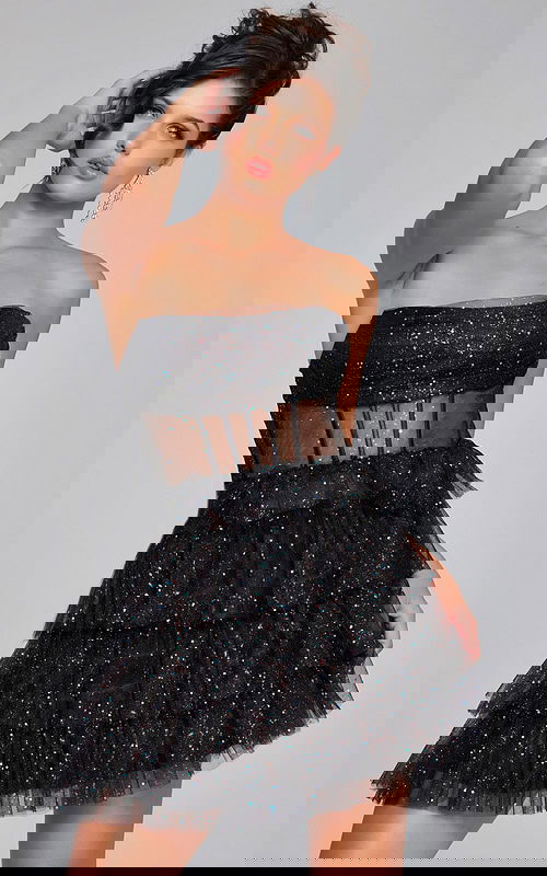 Model wearing Jovani 39666 black dress, front view.