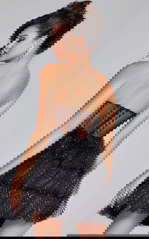 Model wearing Jovani 39666 black dress, back view.