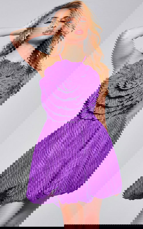 Model wearing Jovani 39741 short purple dress with halter neckline and floral detail