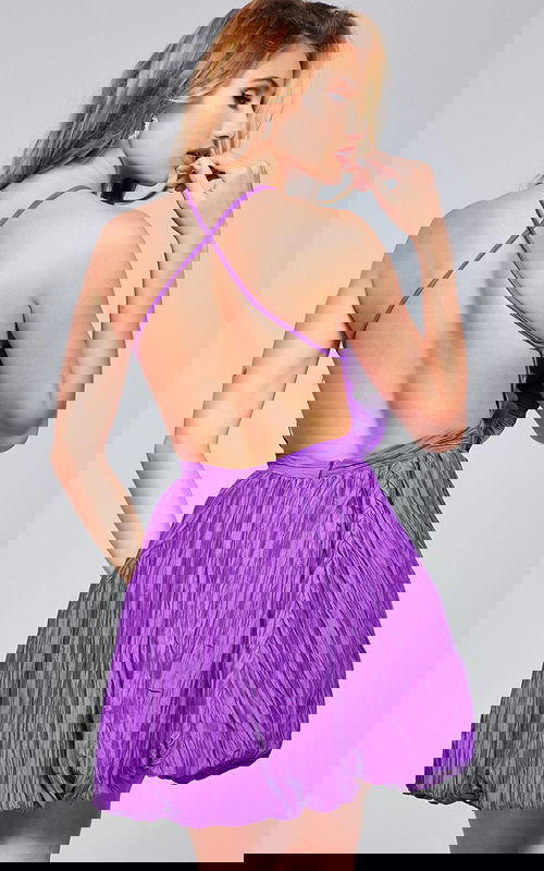 Model showing back of Jovani 39741 purple dress with crisscross strap design