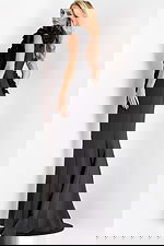 Side view of black mermaid gown with sculpted silhouette