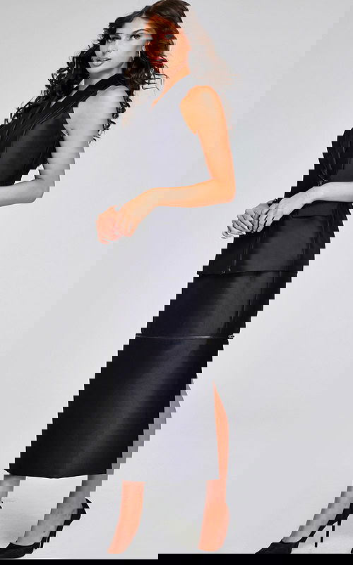 Model wearing Jovani 39801 black sleeveless dress with lapel neckline and side view.