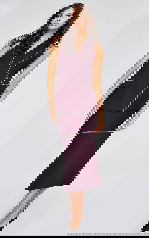 Model wearing Jovani 39802 plum dress with V-neckline and zipper details