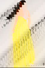 Elegant yellow gown with layered ruffles and halter neckline