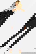 Back View of Black Fitted Pantsuit Featuring Multiple Structured Bows and Spaghetti Straps