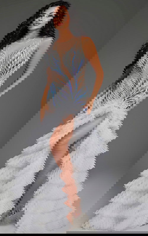 Model showcasing Jovani 39846's detailed beading and flowing skirt, frontal angle.