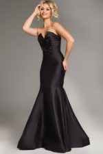 Model wearing Jovani 39872 black mermaid gown with bow detail front view