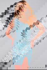 Model wearing Jovani 39896 mini dress in Blue with a charming lace pattern.