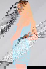 Back view of Jovani 39896 mini dress in Nude with lace-up feature.