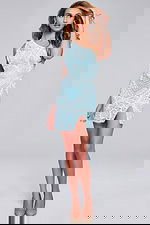 Model wearing Jovani 39896 mini dress in Blue, showcasing high slit.