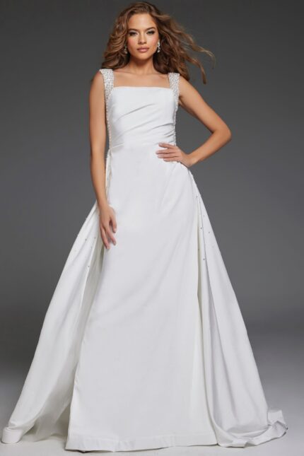 Model showcasing Jovani 39921 white gown with square neckline and flowing skirt