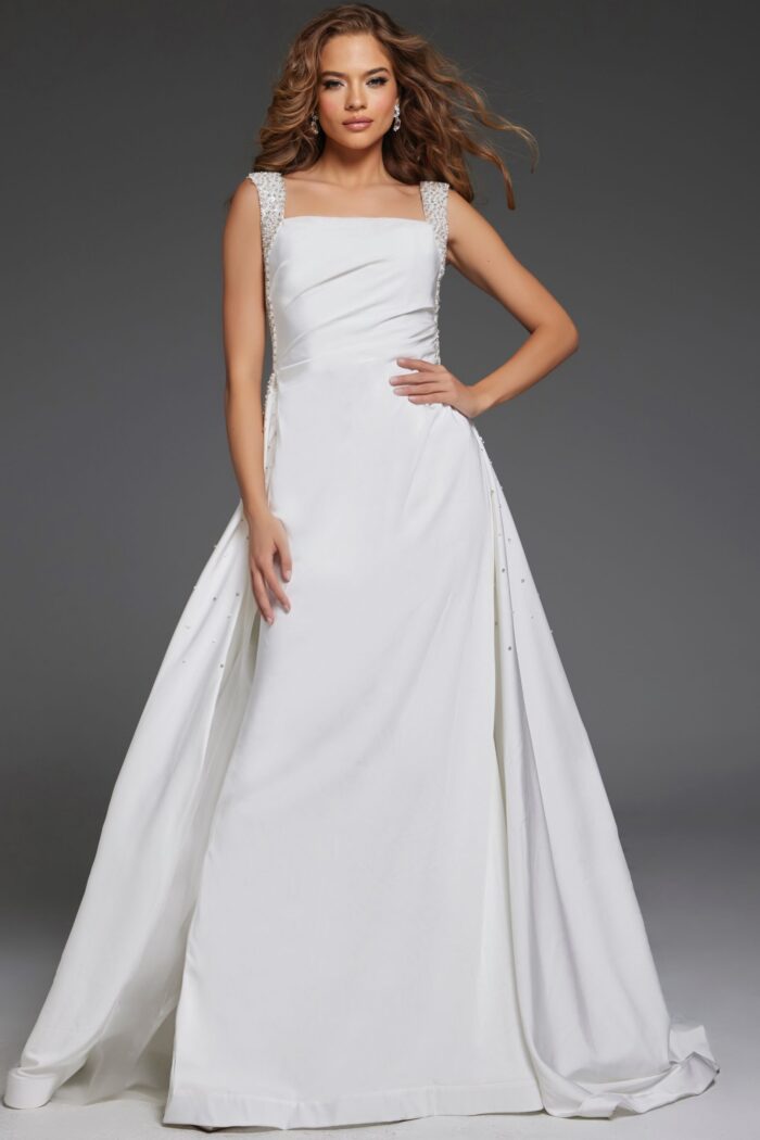 Model showcasing Jovani 39921 white gown with square neckline and flowing skirt