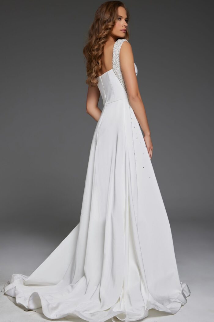 Back view of Jovani 39921 white gown with subtle train and embellished straps