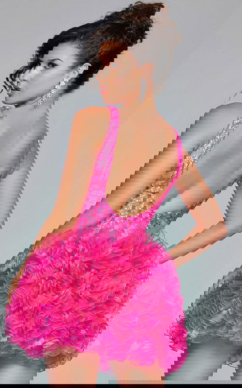 Model wearing Jovani 39931 dress in green featuring a deep V-neckline and ruffled skirt.