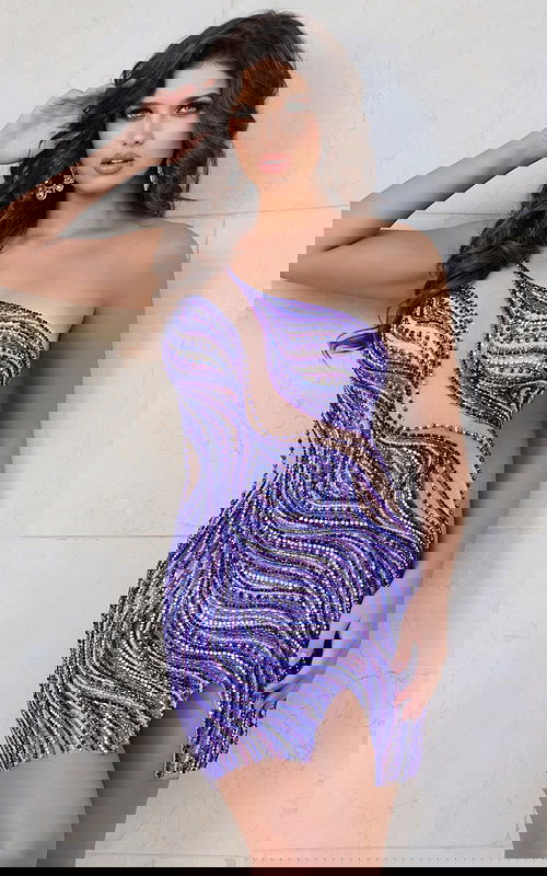 Model in Jovani 39942 multi-color cocktail dress showcasing side view and embellishments.