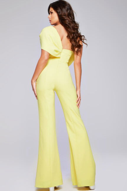 Model wearing Jovani 39961 yellow one-shoulder jumpsuit with wide-leg pants, another back view.