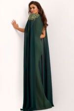 Back view of green formal cape gown with jeweled shoulders