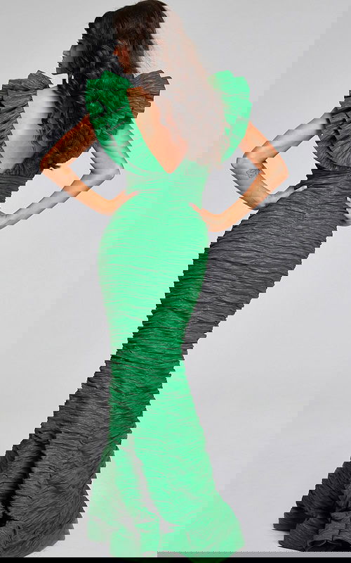 Back view of model wearing Jovani 40044 green dress with V-back design